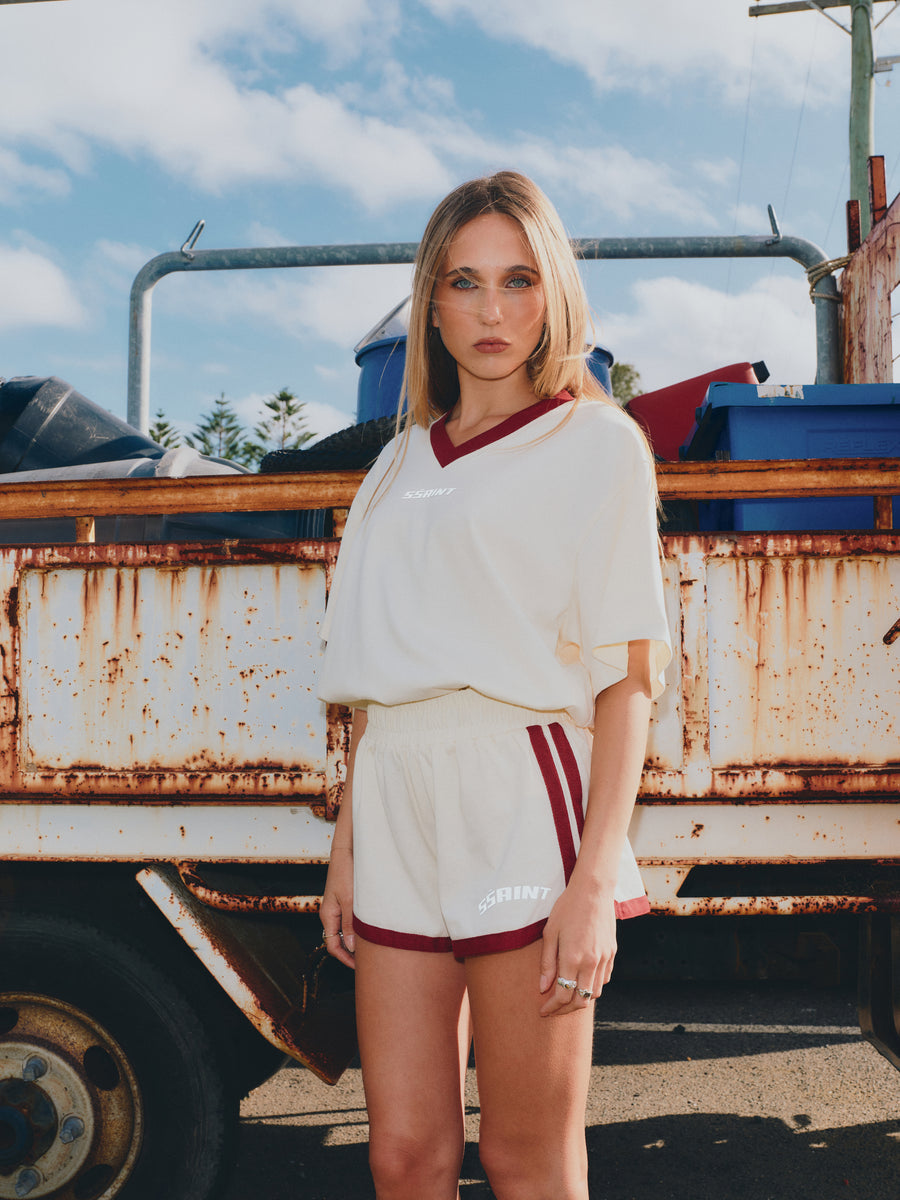 SŚAINT Reflective V Neck Tee | Butter